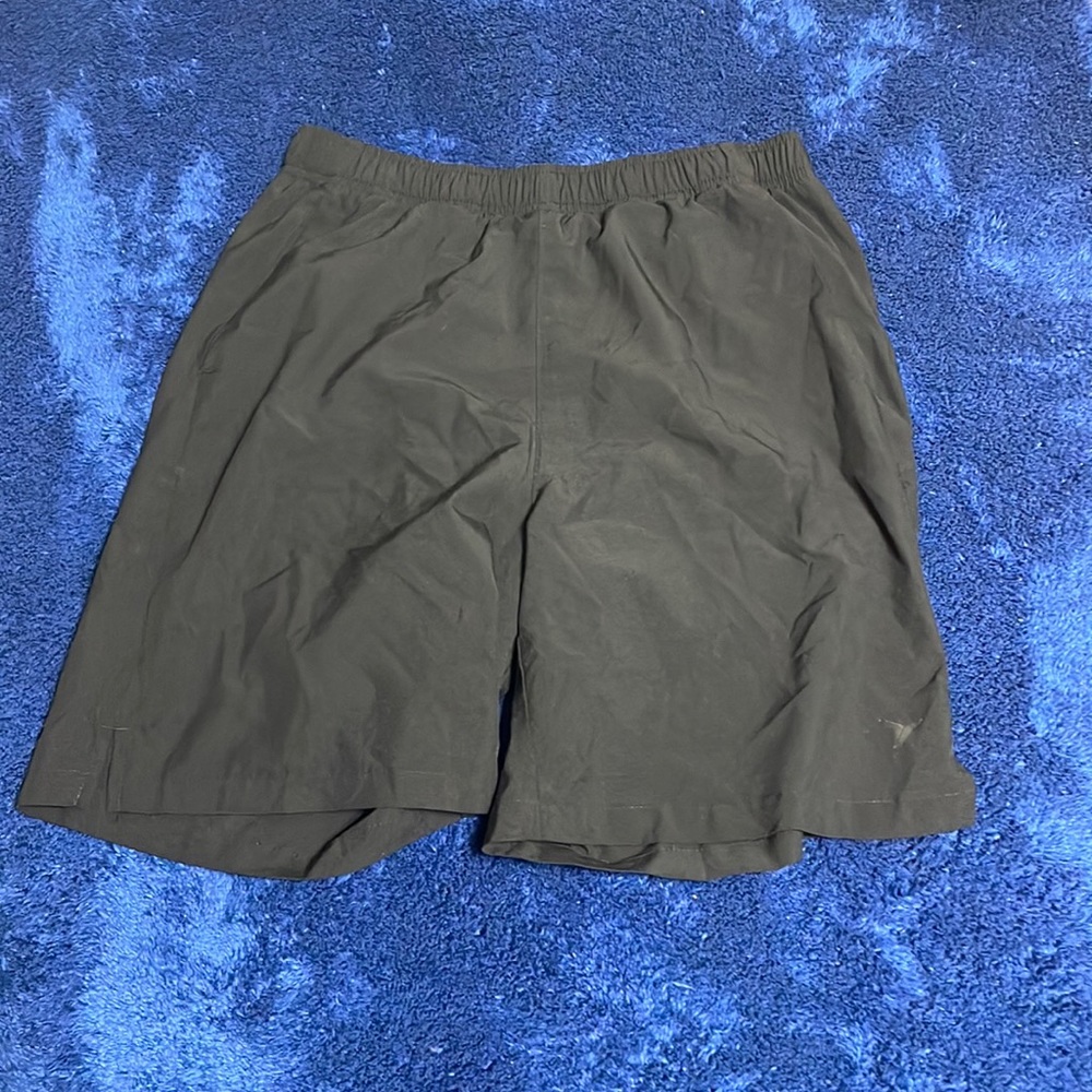 Black, gray, white, and blue shorts